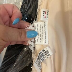 Wedding dress used for ceremony only, about an hour. Fits a so 6/8 women’s body.